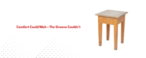 Old rough wooden drum throne stool with visible grain and worn surface, placed on floor. 